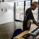 Mandisi Lean mixes music for his upcoming exhibition as part of his one month residency at the Bubblegum Club in Work Shop New Town.